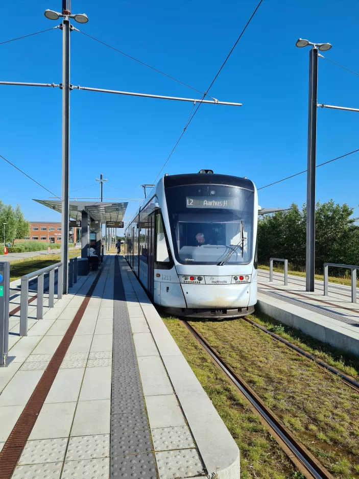Aarhus light rail line L2 with low-floor articulated tram 1111-1211 at Universitetshospitalet (2022)