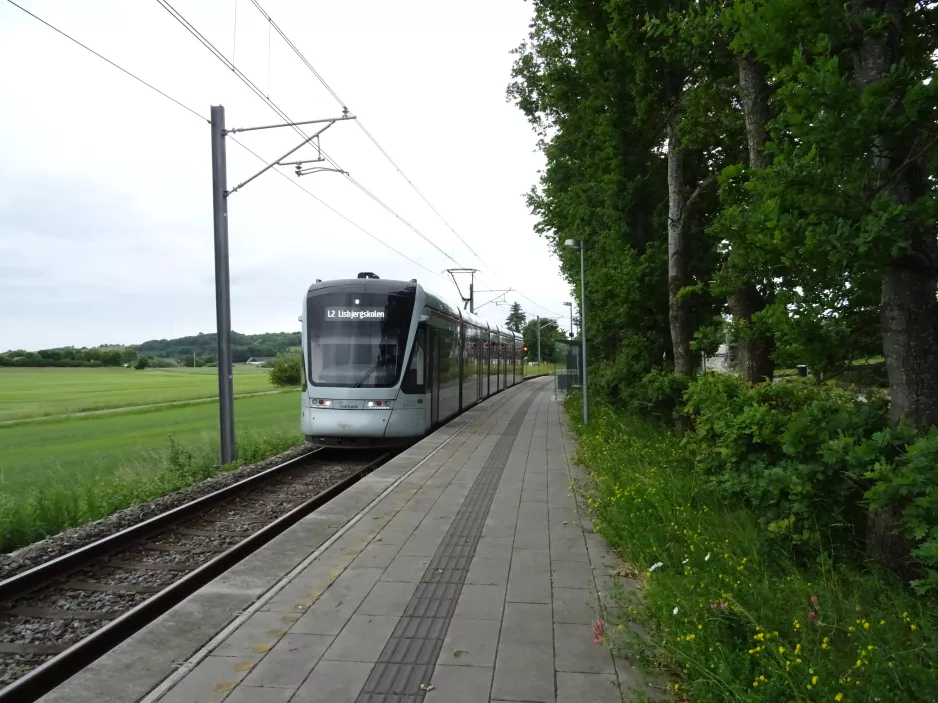 Aarhus light rail line L2 with low-floor articulated tram 1111-1211 on Nørrevænget (2021)