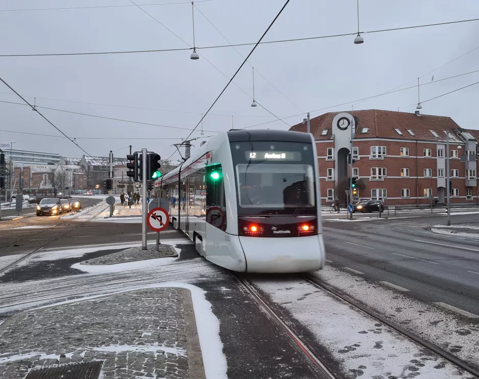 Aarhus light rail line L2 with low-floor articulated tram 2102-2202 close by Nørreport (2021)