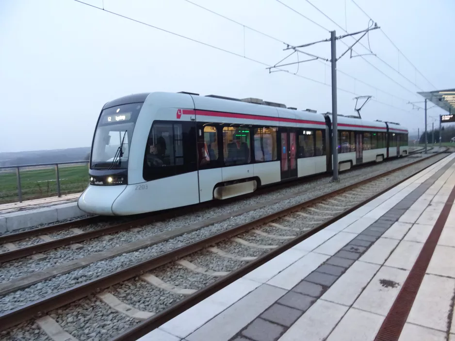 Aarhus light rail line L2 with low-floor articulated tram 2103-2203 at Nye (2022)