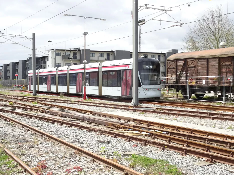 Aarhus low-floor articulated tram 1105-1205 on the side track at Odder seen from the side (2020)