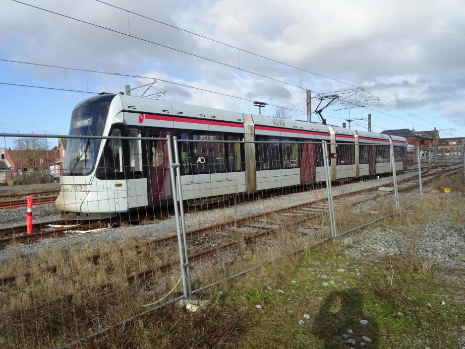 Aarhus low-floor articulated tram 1111-1211 on the side track at Odder (2023)