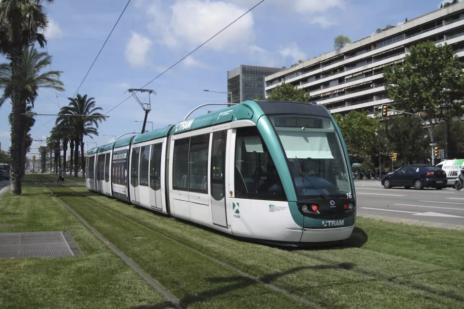 Barcelona tram line T1 with low-floor articulated tram 16 on Maria Cristina Avinguda Diagonal (2012)