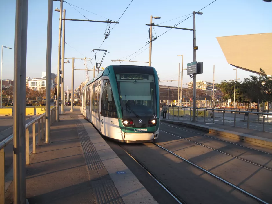 Barcelona tram line T4 with low-floor articulated tram 03 at Ca l'Aranyó (2015)