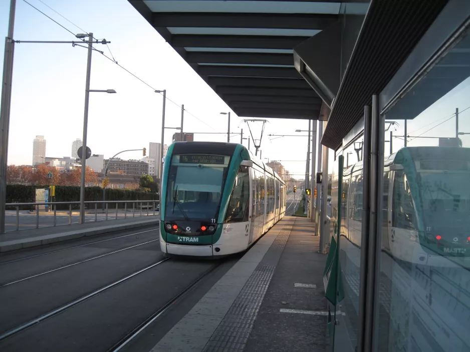 Barcelona tram line T6 with low-floor articulated tram 11 at La Farinera (2015)