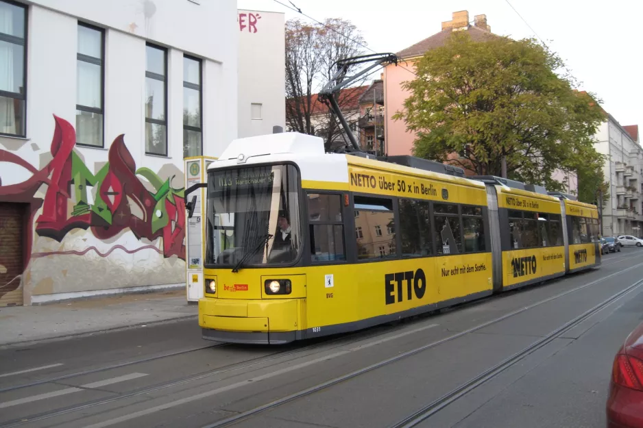 Berlin fast line M13 with low-floor articulated tram 1031 on Boxhagener Straße/Holteistraße (2012)