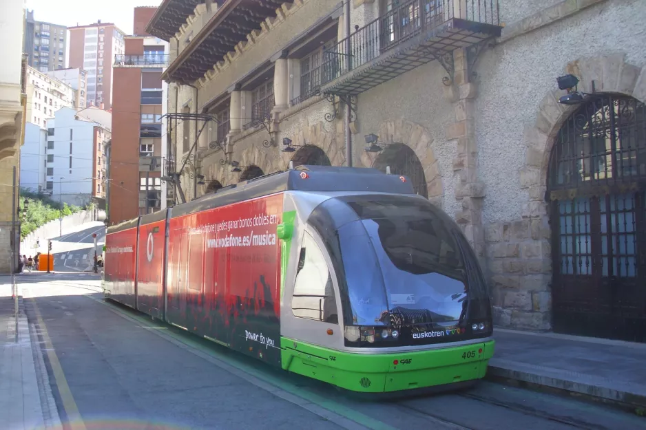 Bilbao tram line A with low-floor articulated tram 405 on Erribera Kalea (2012)