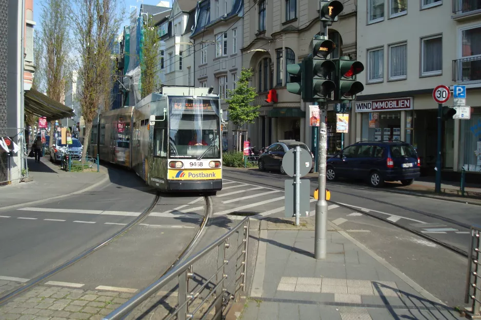 Bonn tram line 62 with low-floor articulated tram 9464 close by Konrad-Adenauer-Platz (2014)