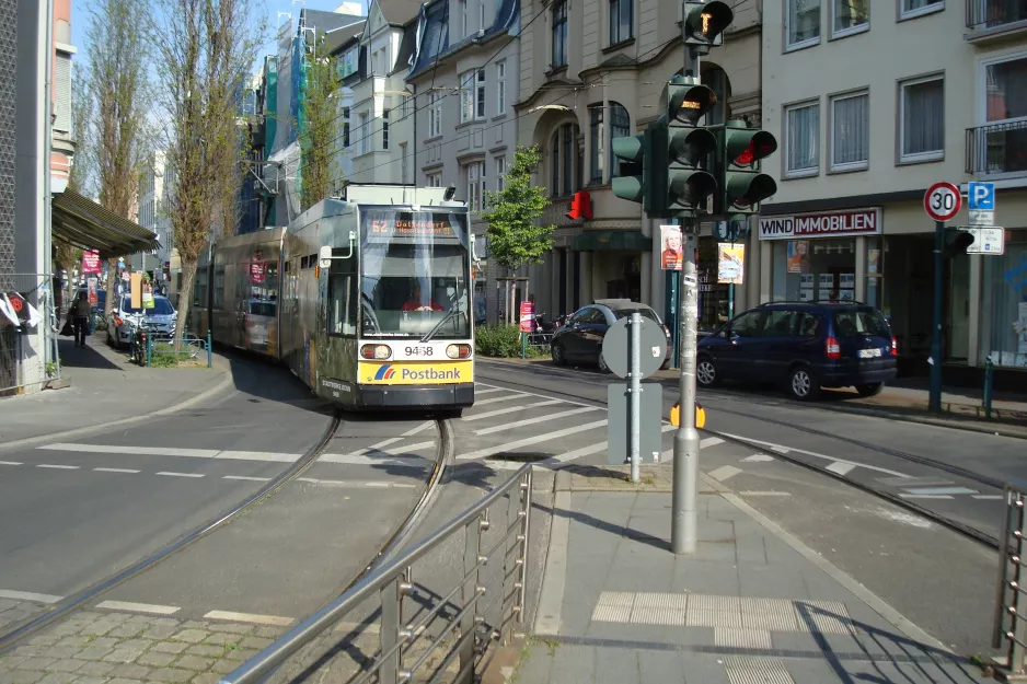 Bonn tram line 62 with low-floor articulated tram 9464 on Friedrich-Breuer-Straße (2014)