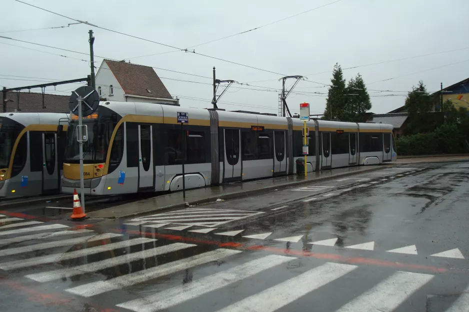Brussels tram line 82 with low-floor articulated tram 3084 at Berchem Station / Gare de Berchem (2014)