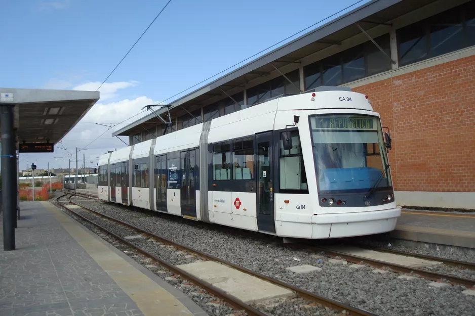 Cagliari tram line 1 with low-floor articulated tram 04 at San Gottardo (2010)