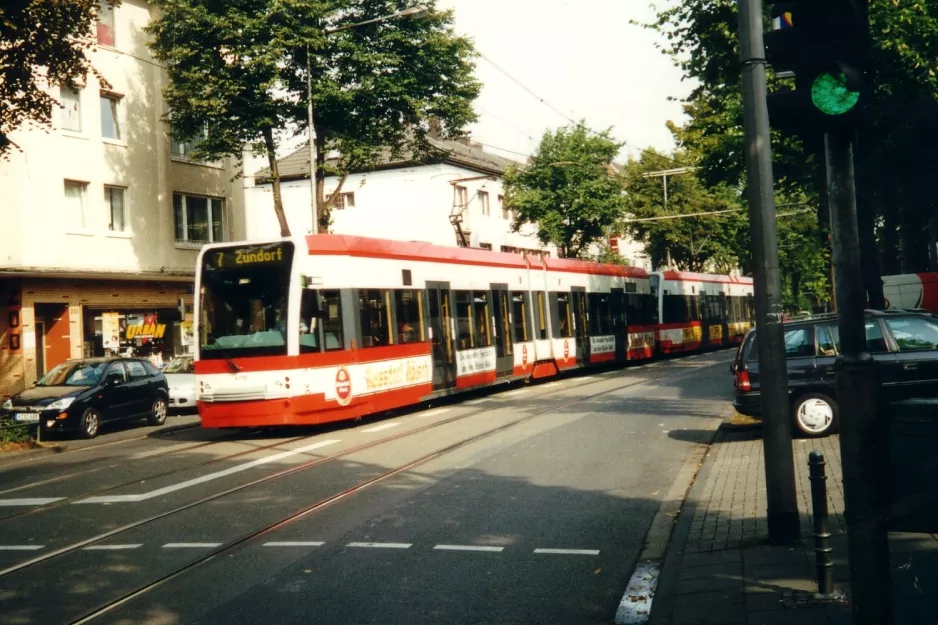 Cologne tram line 7 with low-floor articulated tram 4109 near Raiffeisenstraße (2002)