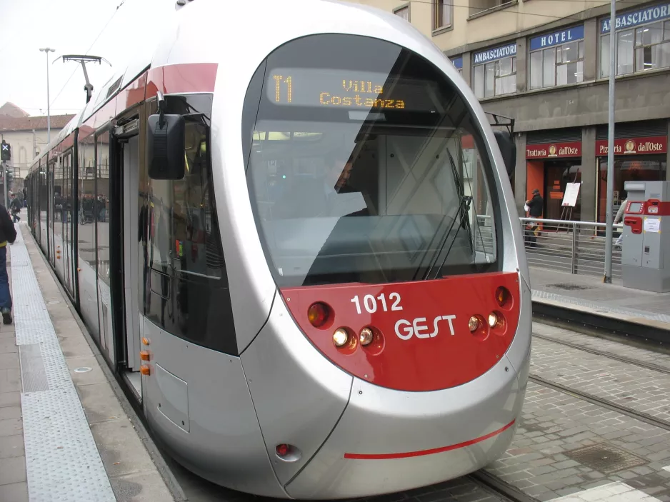 Florence tram line T1 with low-floor articulated tram 1012 by Alamanni - Stazione (2010)