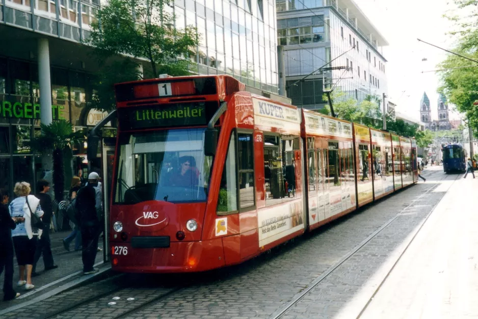 Freiburg im Breisgau tram line 1 with low-floor articulated tram 276 at Stadttheater (2003)
