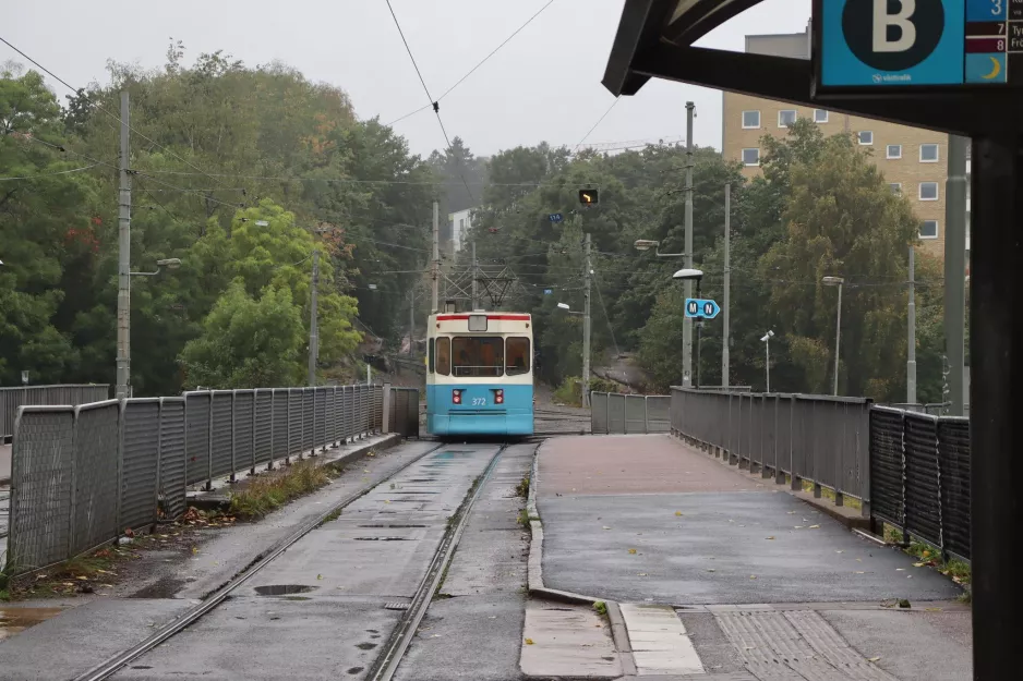 Gothenburg tram line 8 with articulated tram 372 "Per Nyström" on Högsboleden (2020)