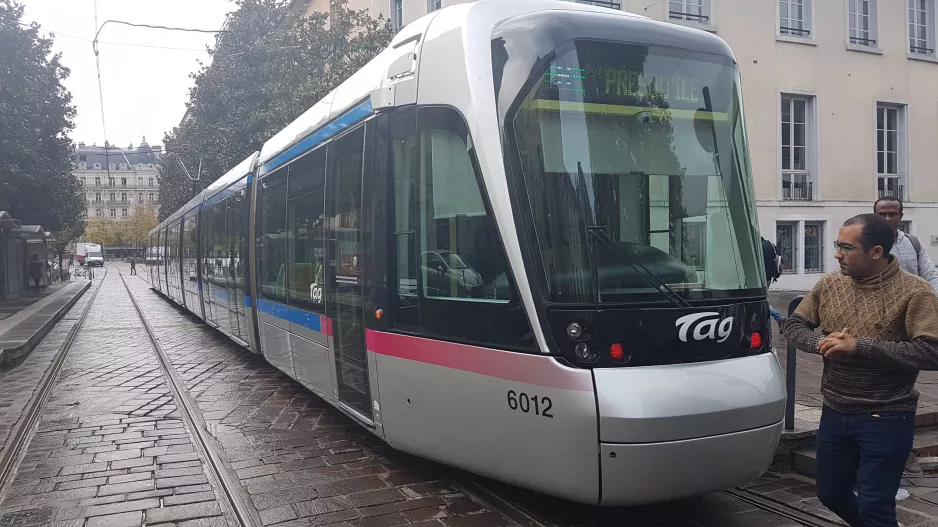 Grenoble tram line B with low-floor articulated tram 6012 at Notre-Dame Musée (2018)