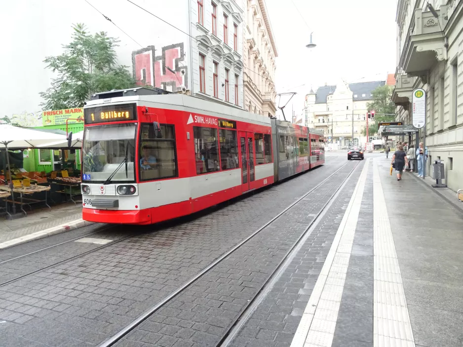Halle (Saale) tram line 1 with low-floor articulated tram 606 at Joliot-Curie-Platz (2023)