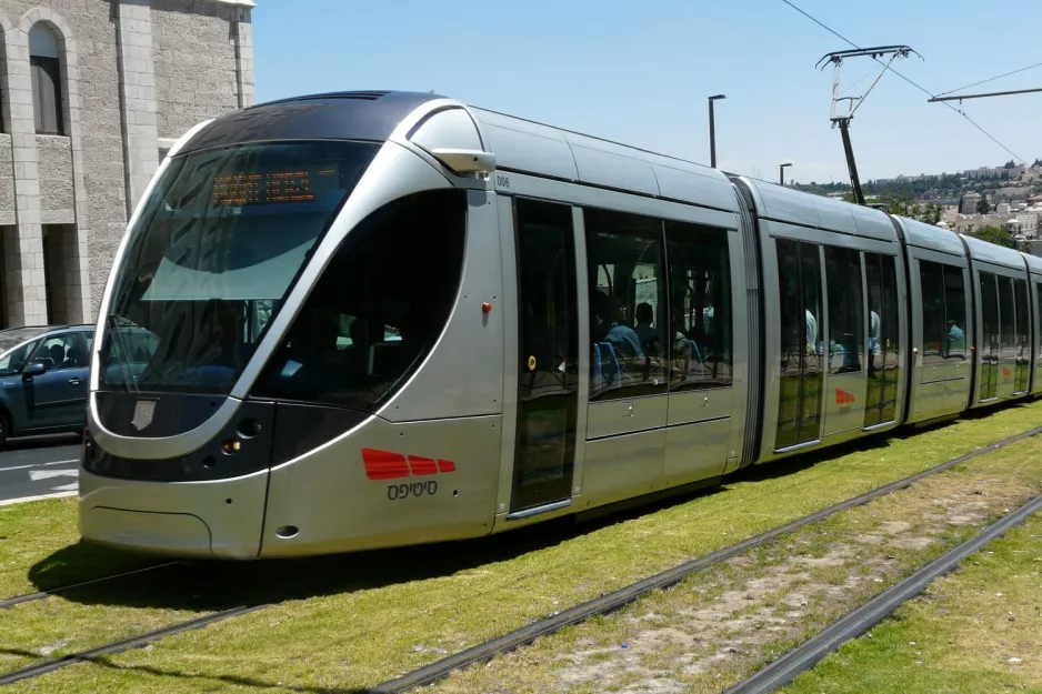 Jerusalem light rail line L1 with low-floor articulated tram 006 on Paratroopers Road (2012)