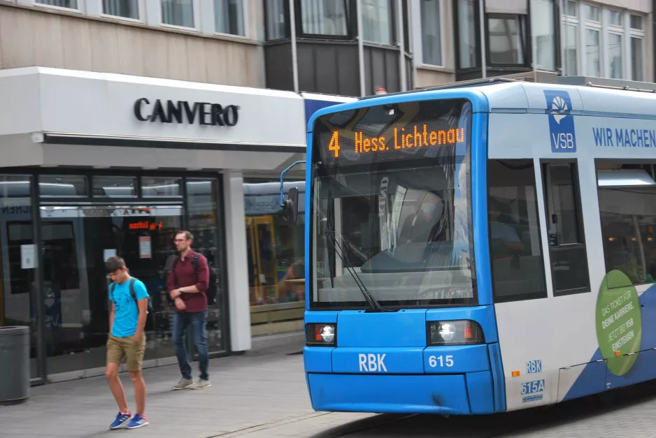 Kassel tram line 4 with low-floor articulated tram 615 in front of Obere Königsstraße 22 (2022)