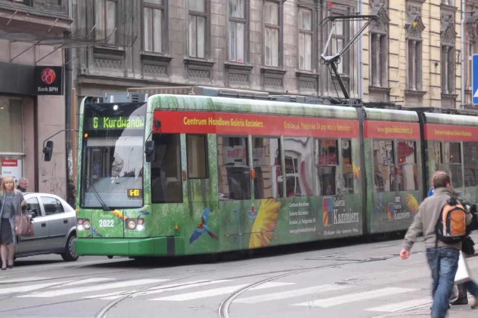 Kraków extra line 6 with low-floor articulated tram 2022 on Uliga Stradomska (2011)