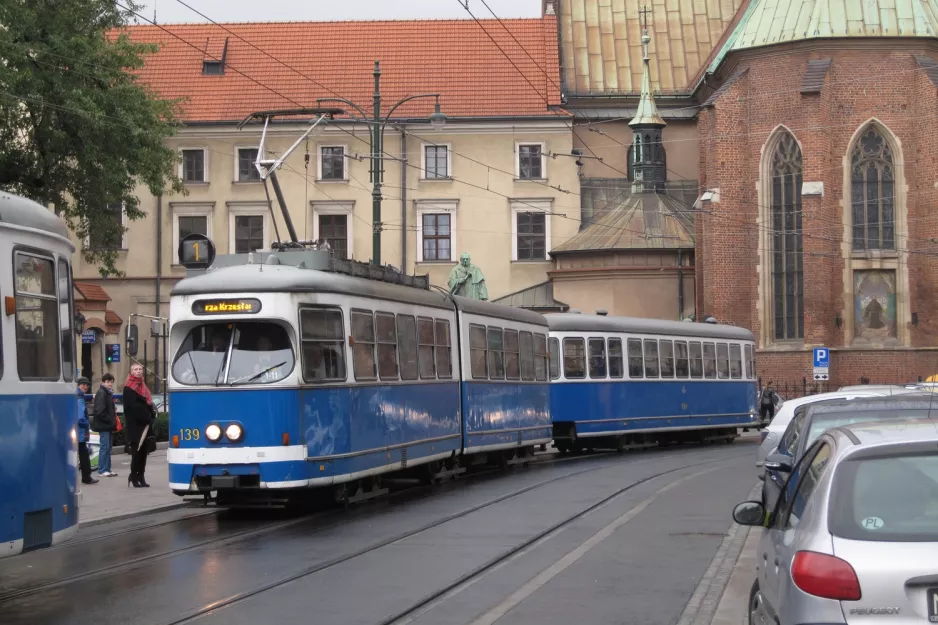Kraków tram line 1 with articulated tram 139 at Plac Wszystkich Świętych (2011)