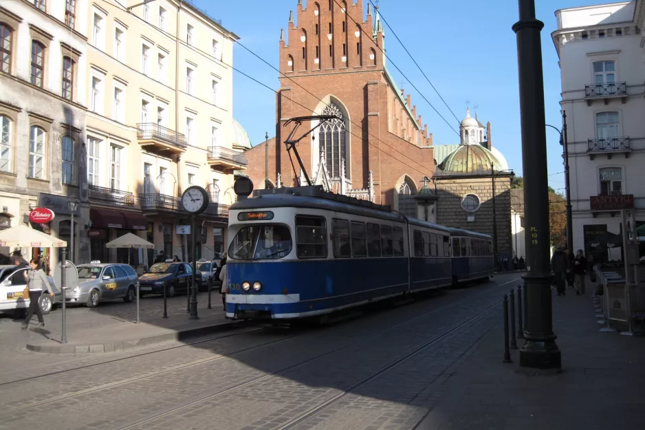 Kraków tram line 2 with articulated tram 130 at Plac Wszystkich Świętych (2011)