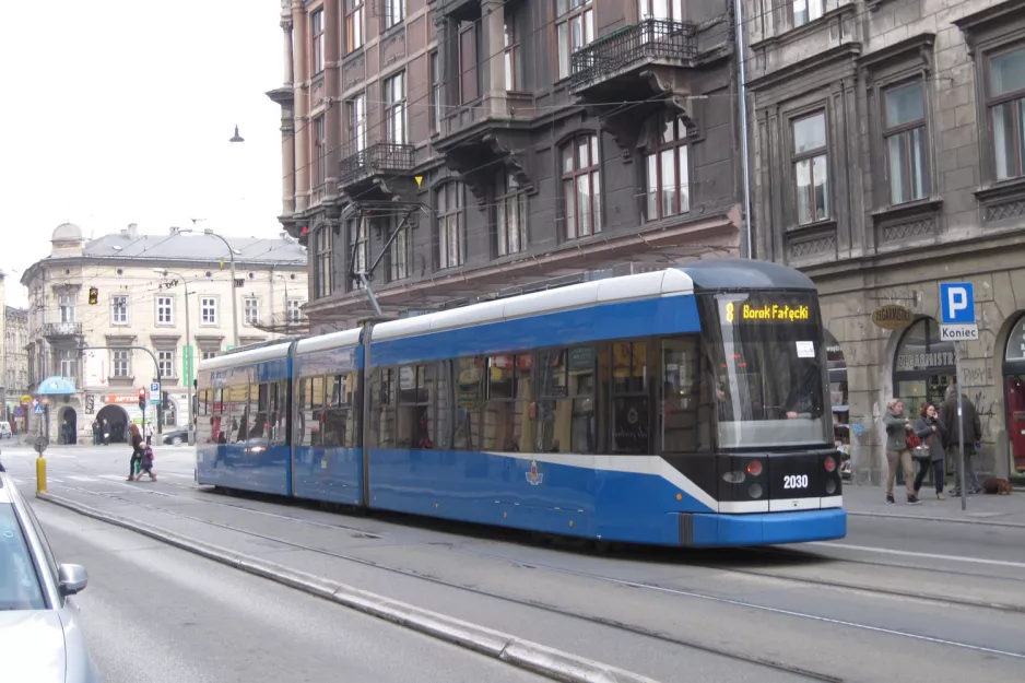 Kraków tram line 8 with low-floor articulated tram 2030 on Stradomska (2011)