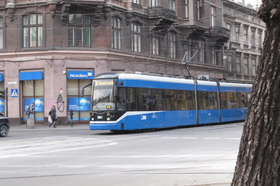 Kraków tram line 8 with low-floor articulated tram 2041 on Stradomska (2011)