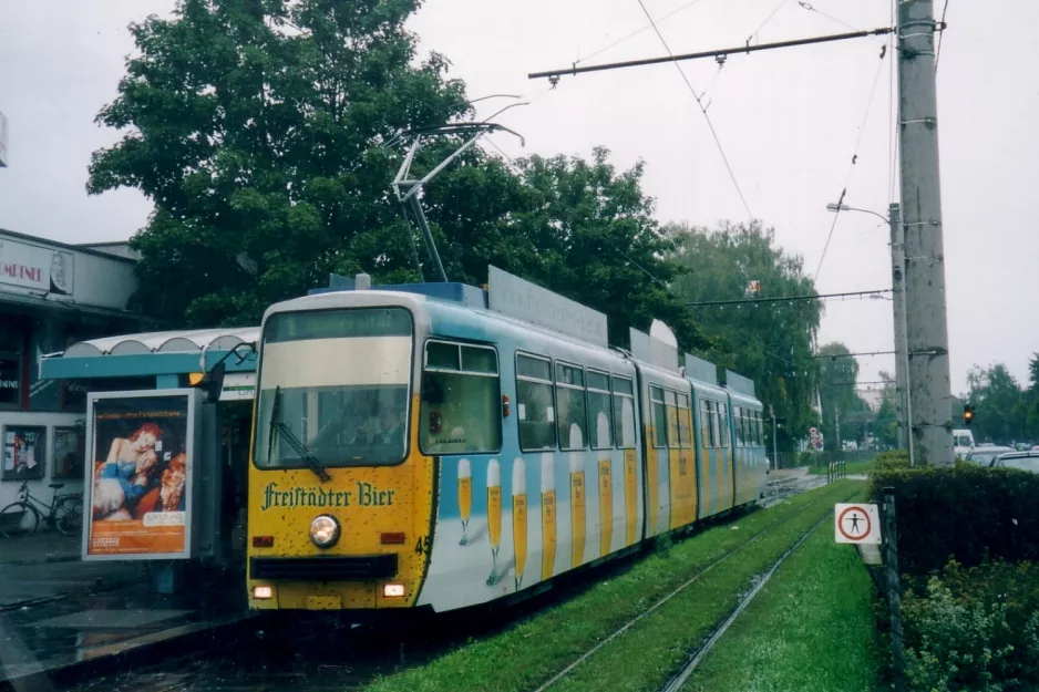 Linz tram line 1 with articulated tram 45 at Auwiesen (2004)