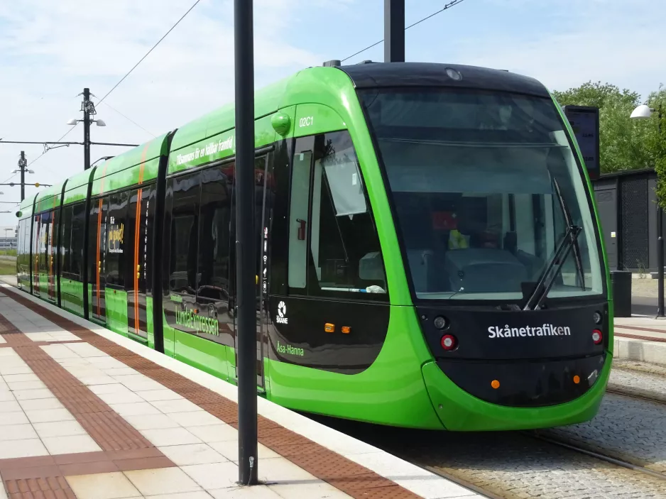 Lund tram line 1 with low-floor articulated tram 02 (Åsa-Hanna) at MAX IV (2022)