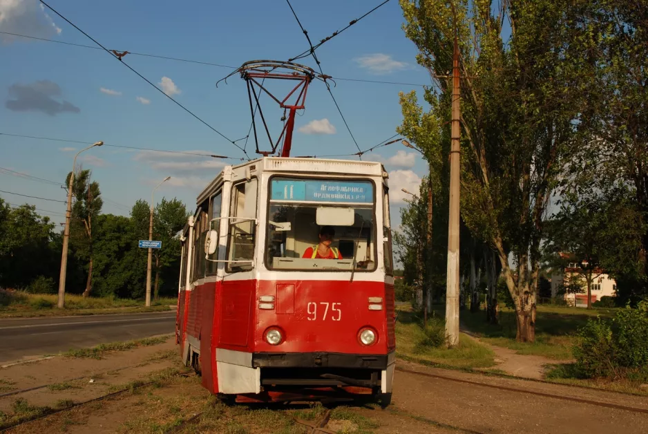 Mariupol tram line 11 with railcar 975 in the intersection Huhelya Street/Nabarezhna Street (2012)