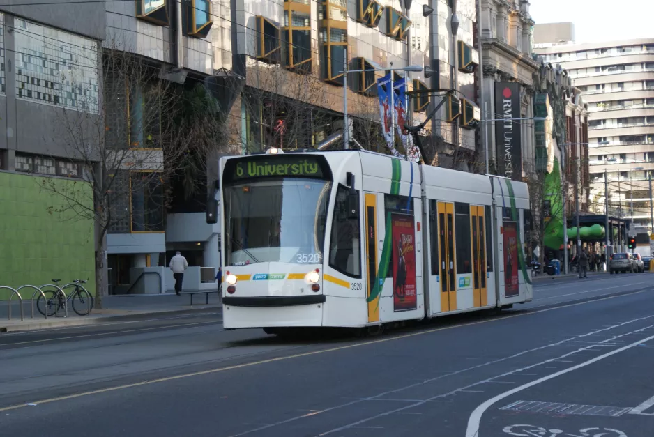 Melbourne tram line 6 with low-floor articulated tram 3520 near Lincoln Square (2010)