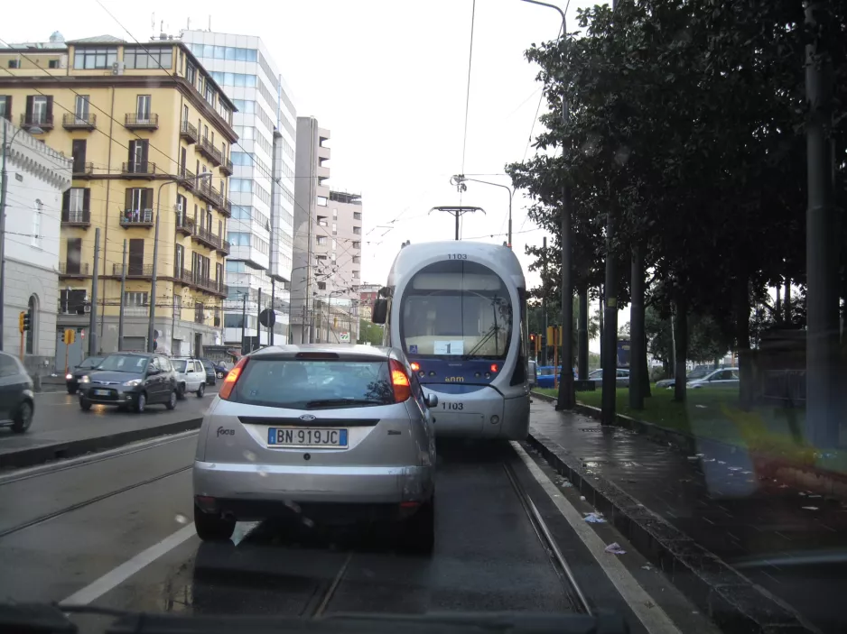Naples tram line 1 with low-floor articulated tram 1103 on Via Amerigo Vecpucci (2014)