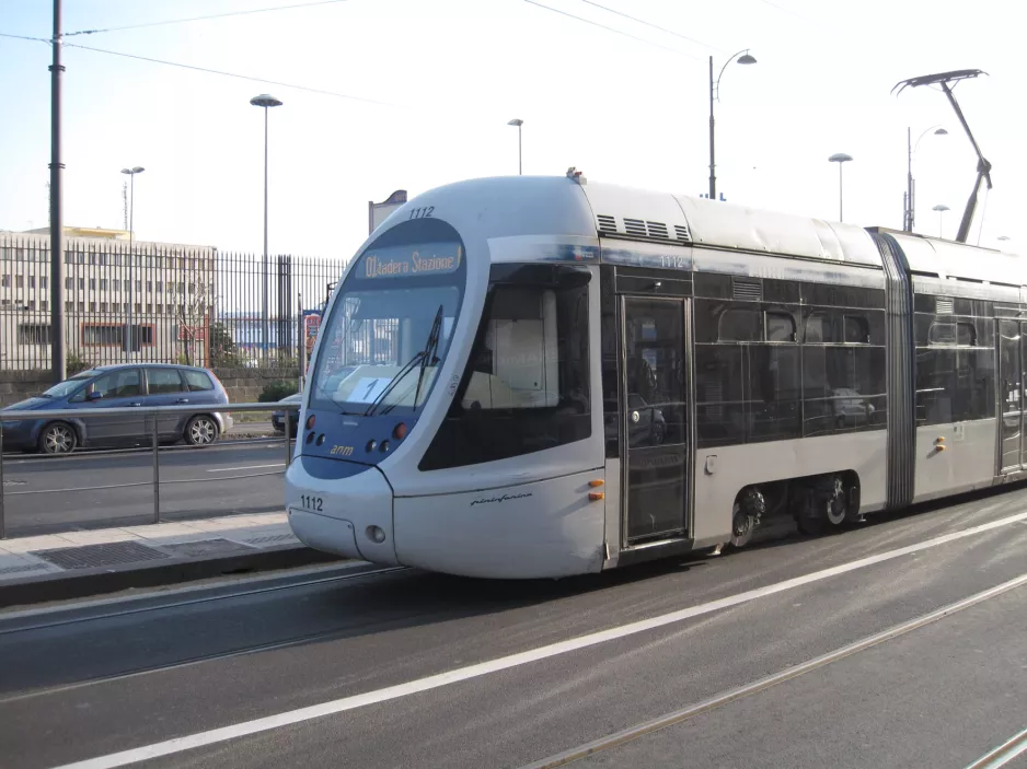 Naples tram line 1 with low-floor articulated tram 1112 on Via Amerigo Vecpucci (2014)