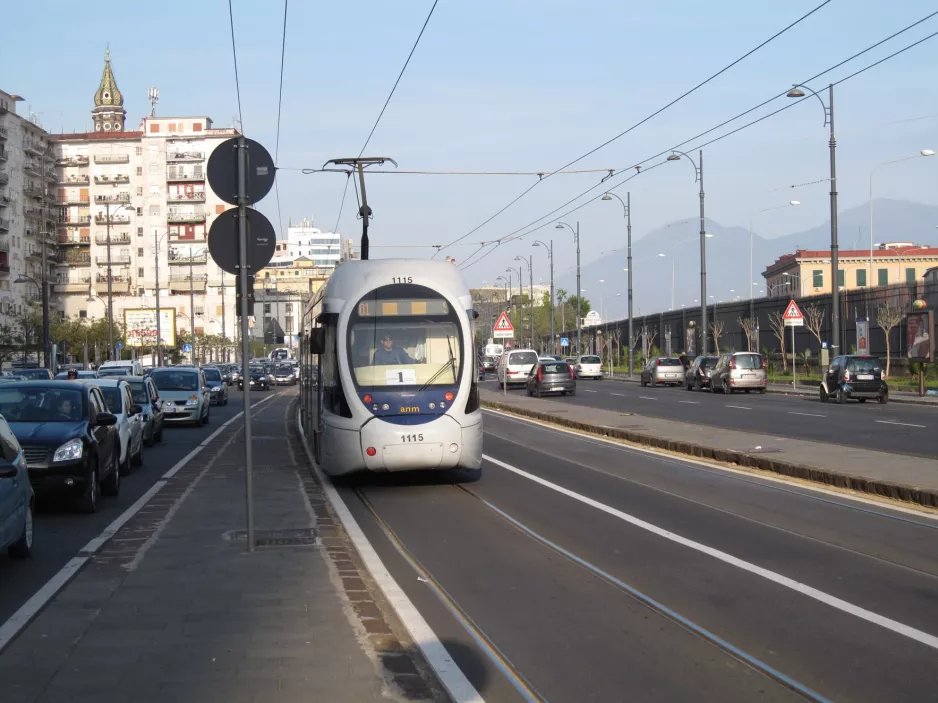 Naples tram line 1 with low-floor articulated tram 1115 on Via Amerigo Vecpucci (2014)