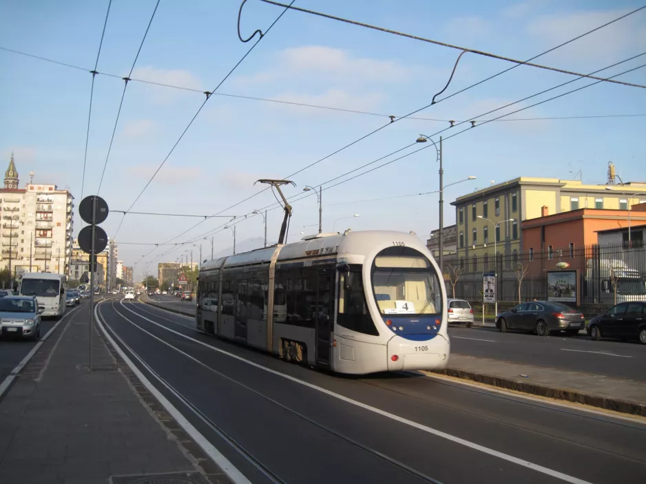 Naples tram line 4 with low-floor articulated tram 1105, side view Via Amerigo Vecpucci (2014)