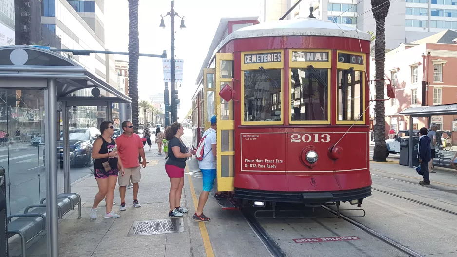 New Orleans line 47 Canal Streetcar with railcar 2013 at Canal + Decatur (2018)