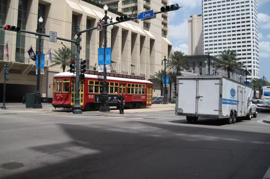 New Orleans line 47 Canal Streetcar with railcar 2023 at Canal / Camp (2010)