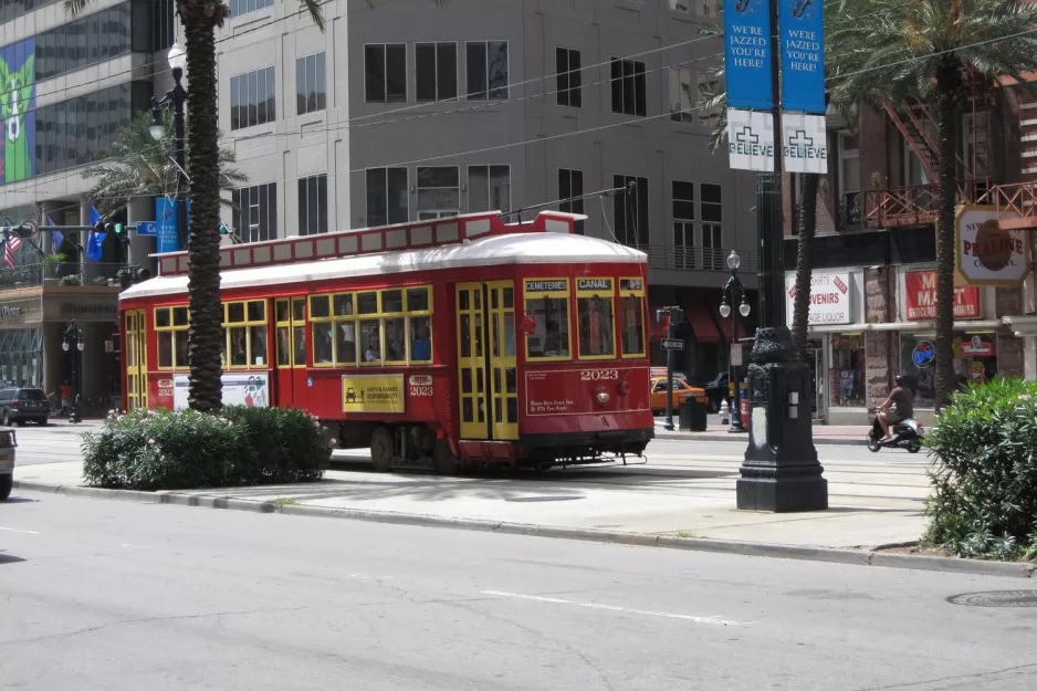 New Orleans line 47 Canal Streetcar with railcar 2023 at Canal / S Peters (2010)