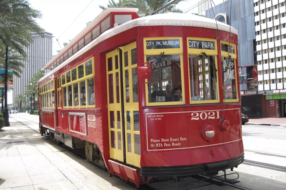 New Orleans line 48 Canal Streetcar with railcar 2021 near Canal / S Peters (2010)