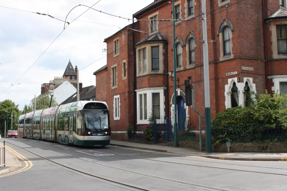 Nottingham tram line Green with low-floor articulated tram 213 "Mary Potter" on Waverley Street (2011)