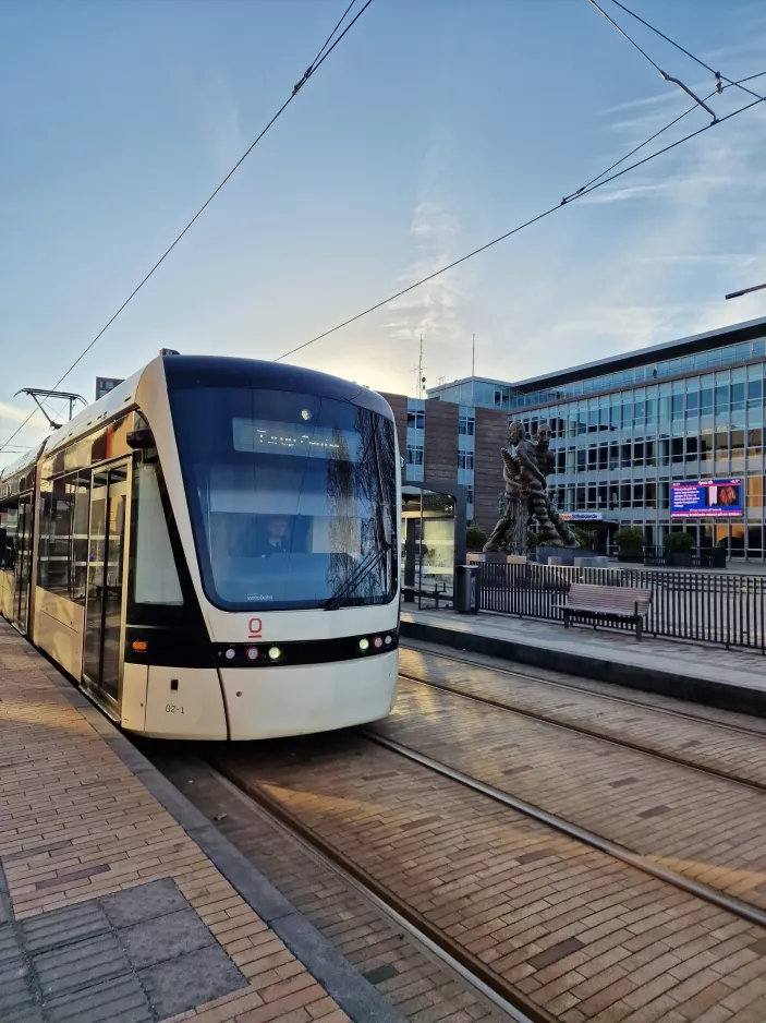 Odense low-floor articulated tram 02 "Kompasset" at Central Station (2023)
