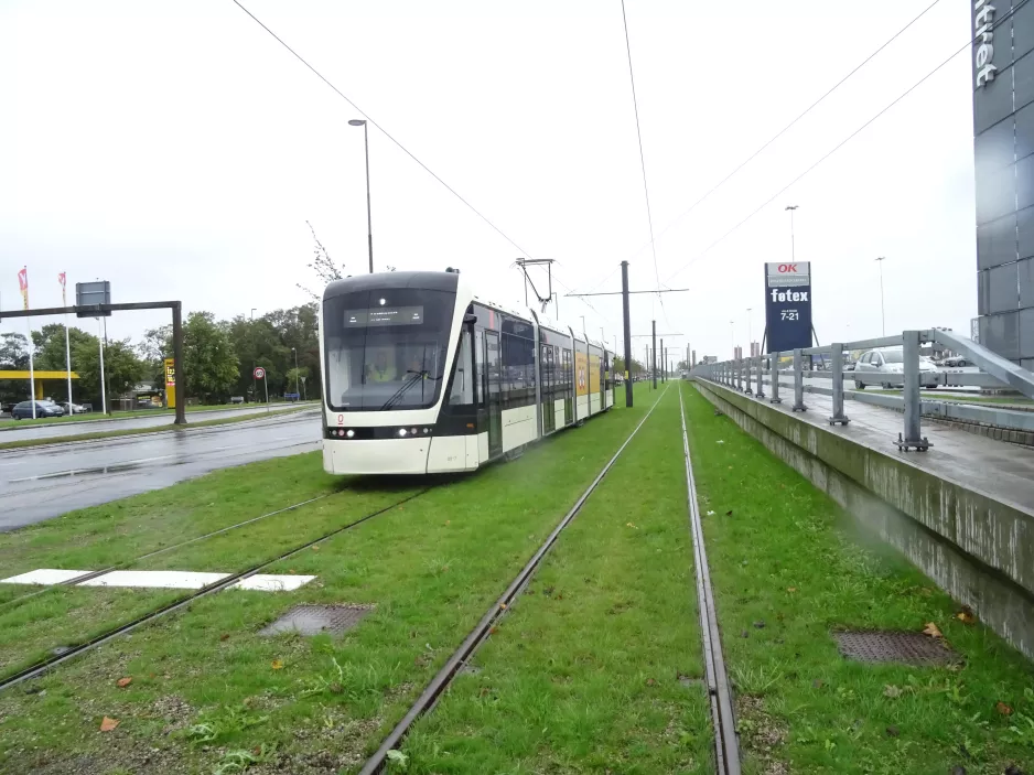 Odense low-floor articulated tram 08 "Eventyret" near Rosengårdcentret (2021)