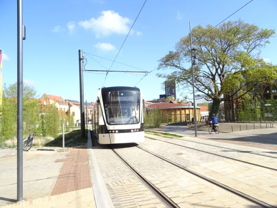 Odense low-floor articulated tram 15 "Symfonien" near Albani Torv (2022)