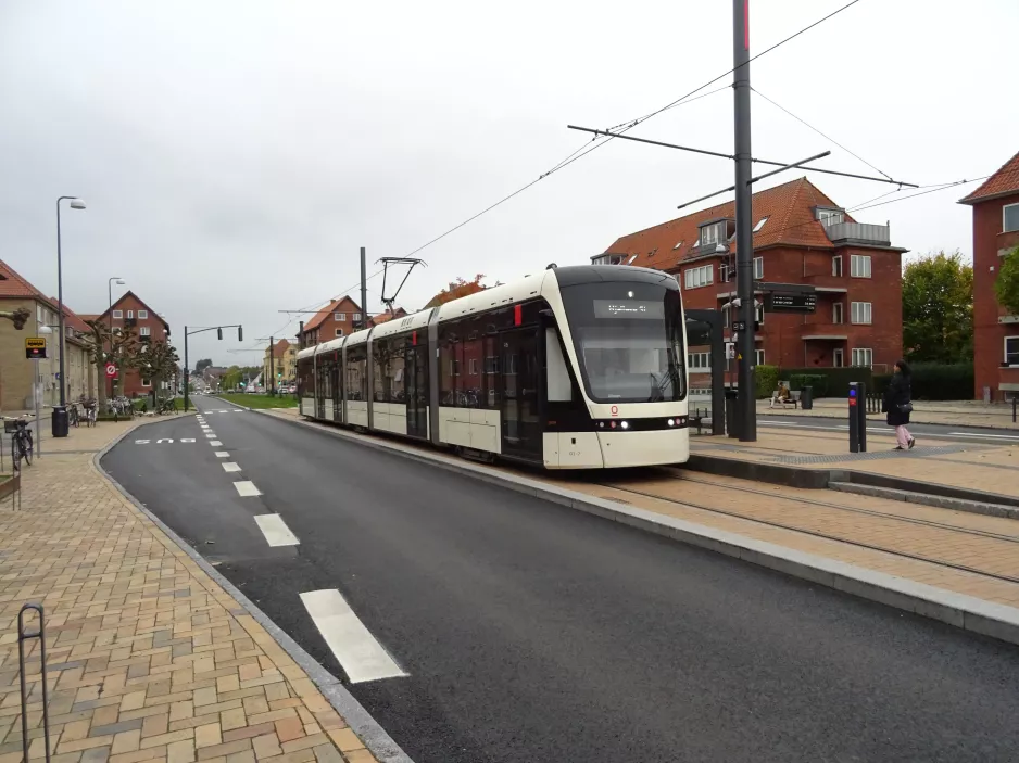 Odense Tramway with low-floor articulated tram 01 "Brunneren" at Bolbro (2022)