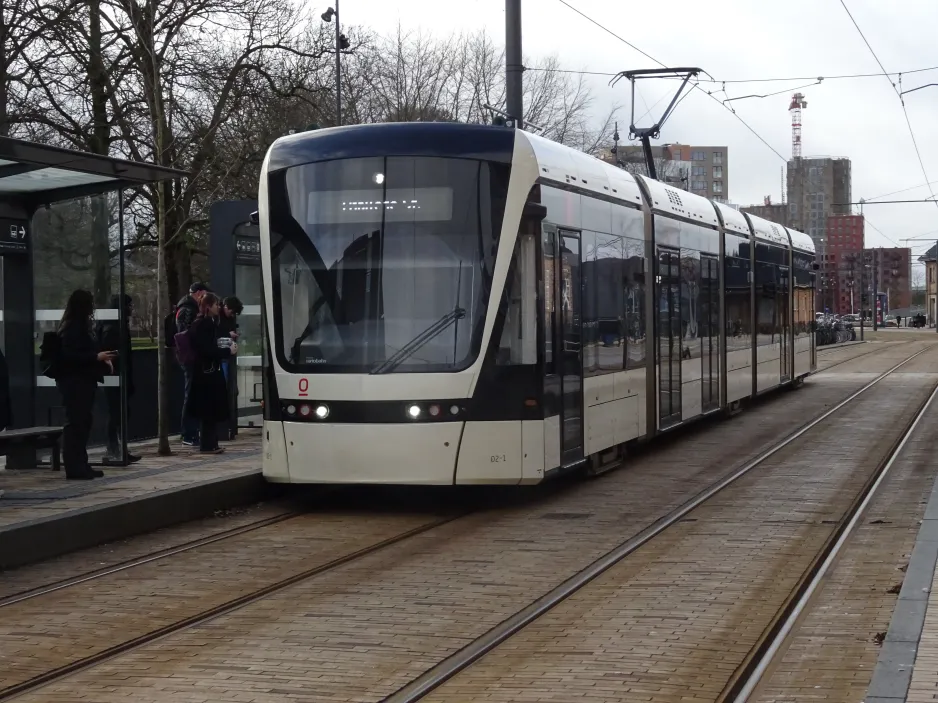 Odense Tramway with low-floor articulated tram 02 "Kompasset" at Banegården / Central Station (2024)