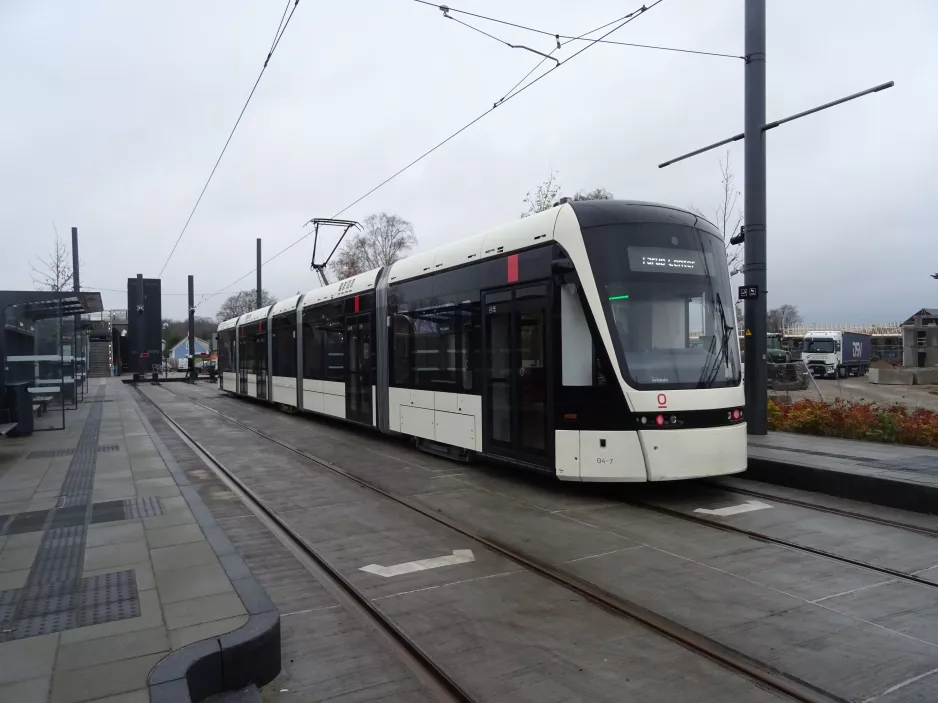 Odense Tramway with low-floor articulated tram 04 "Strømmen" at Hjallese St (2022)