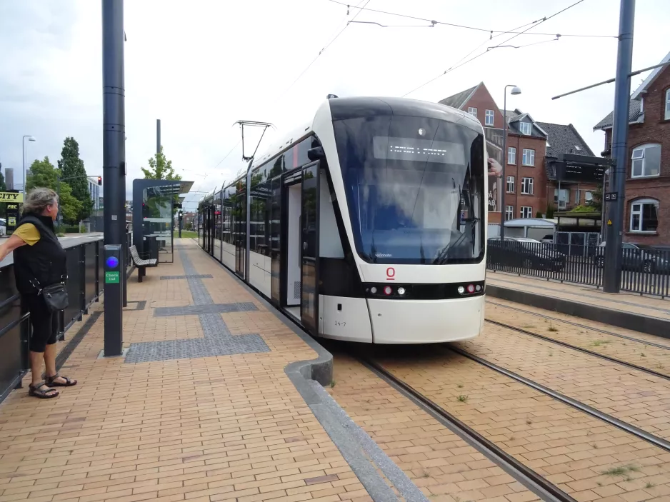 Odense Tramway with low-floor articulated tram 14 "Pusterummet" at Vester Stationsvej (2022)