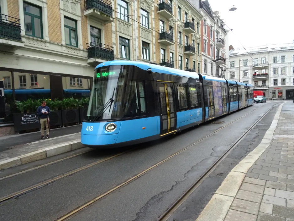 Oslo tram line 12 with low-floor articulated tram 418 near Niels Juels gate (2024)