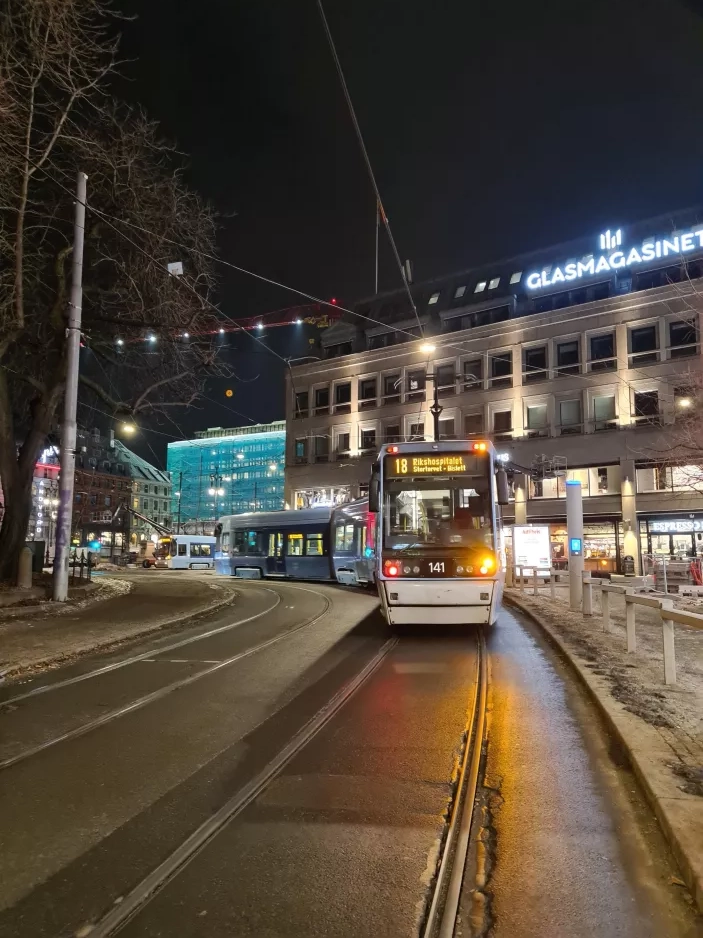 Oslo tram line 18 with low-floor articulated tram 141 on Kirkeristen (2022)